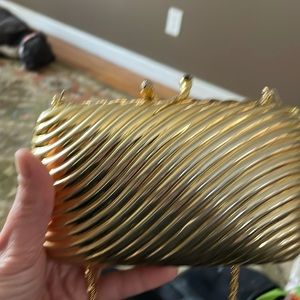 Vintage shell bag in gold coloring.